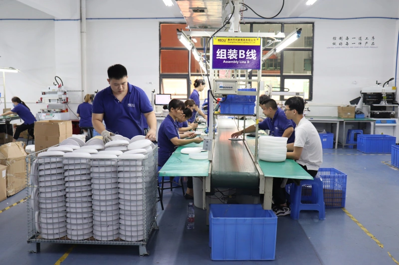 Production Workshop (3)Workers assemble round LED panel lights on KEOU conveyor production line