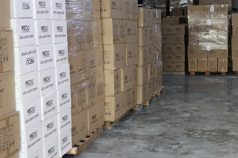 Warehouse Floor (2)Stacked finished KEOU LED light cartons ready for bulk wholesale shipment